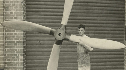 man standing with propella