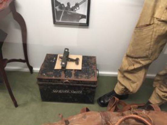 box with plane model on it 
