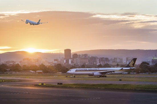 plane taking off at Adelaide Airport