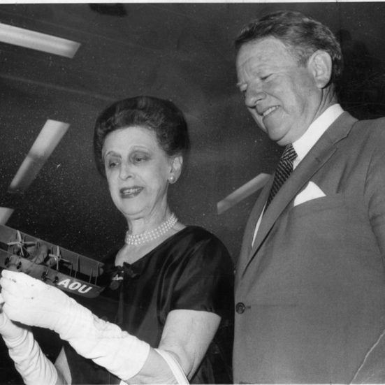  Lady Smith (Anita), widow of pioneer aviator Sir Keith Smith, with a model of the famous Vickers Vimy