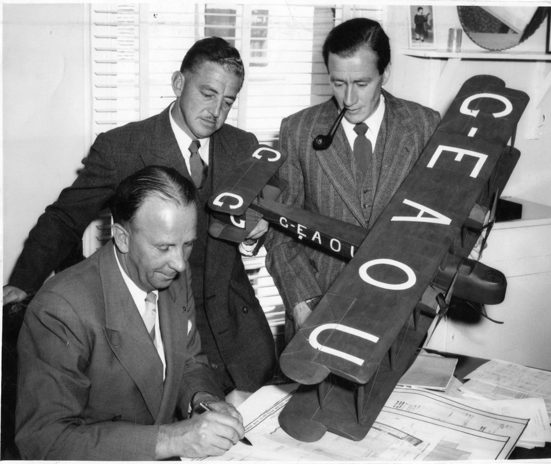 three me drawing up plans of the vickers vimy