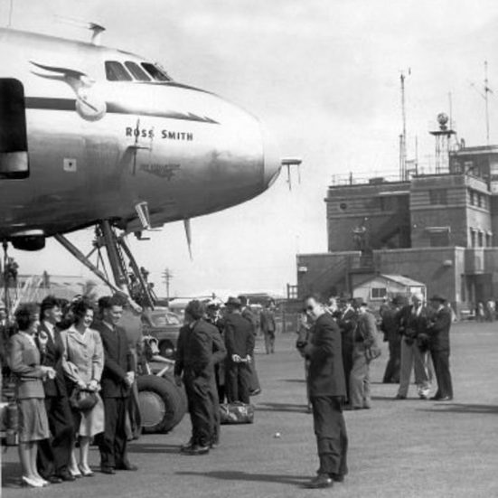 plane with crowd around it