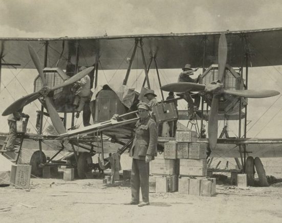 men loading up the vimy