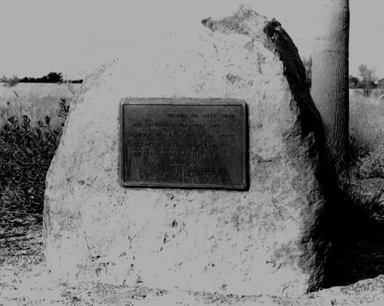 rock with plaque on it