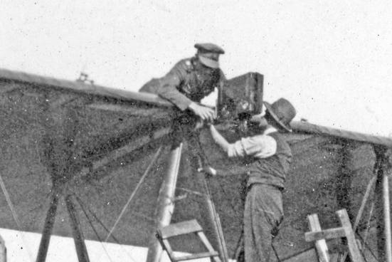 Men fixing the vimy plane  