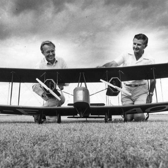 two people with a model 